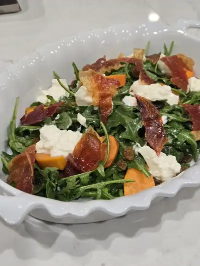 Arugula salad with crispy prosciutto, burrata and roasted butternut squash by Nashville Chef Mollie